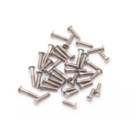 Button Head Hex Socket Screws Bolts Nuts With Driver Included Eyeglasses Repair Kit scattered on white surface