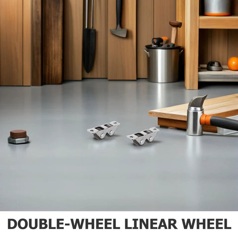Rock Solid Mini Fixed Caster Wheels Set Of Four With Double Row Carbon Steel Build For Precision Tables and mobile workstations on a workshop floor.