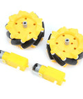 Front view of two yellow 80mm mecanum wheels with rubber-coated rollers and two yellow geared motors