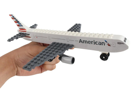 Licensed Airline Construction Block Kit With 55 Pieces And Pilot Figure Interchangeable With Other Brands Totally Great For Kids Who Love Planes Building And Imaginative Play held in hand