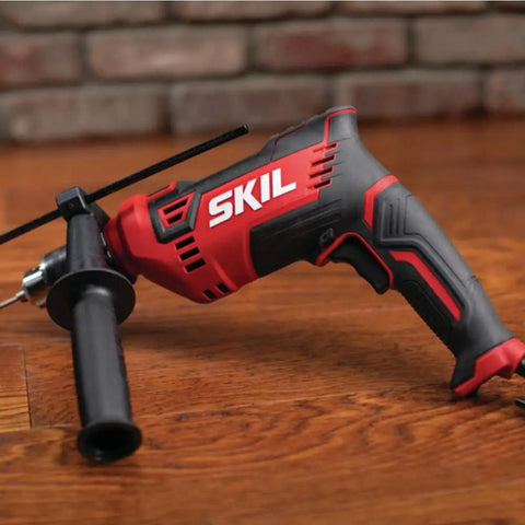 7.5 Amp Half Inch Corded Hammer Drill With 2 In 1 Drilling And Hammer Function on wooden floor