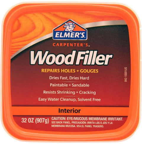 Image of Elmer's Carpenter's Wood Filler, 32 oz container, labeled for interior use, features: repairs holes, gouges, fast dry, paintable and sandable.