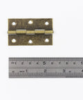 2.5 Inch Folding Butt Hinges Antique Bronze 12-Pack Heavy Duty Iron Hinges with ruler for size reference