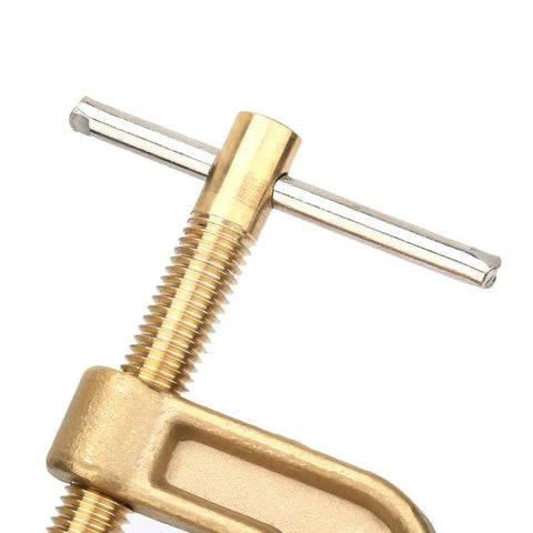 Close-up of Solid G Shape Ground Welding Earth Clamp Made From Premium Brass, featuring a robust grip mechanism for welding tasks.