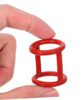 Close-up of a red silicone gasket in hand, part of the 13 Piece Silicone Seal Replacement Gaskets For Ice Cream Makers set.