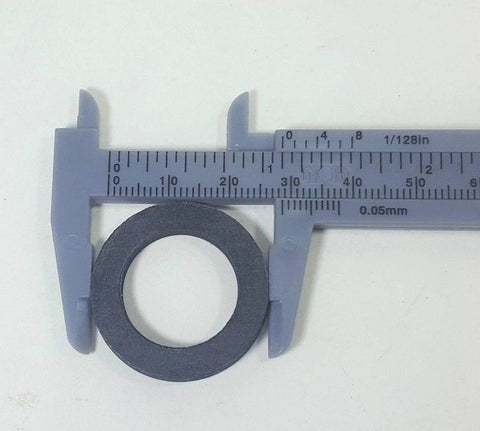 Close-up of gray EPDM water meter gasket, 3/4 in x 1/8 in, circular seal for 5/8×3/4 or 3/4 meter