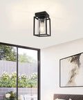 Matte Black Semi Flush Mount Ceiling Light Fixture With Clear Glass Shade Farmhouse Style in a modern living room setting