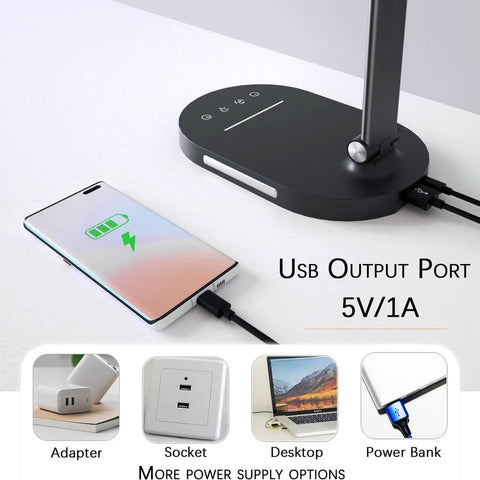 Must-Have Three Color Reading Desk Lamp With USB Charging Port shown charging a phone, featuring a 5V/1A output, black finish.