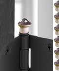 Decorative Hinge Head Topper Set Of 6 Magnetic Mushroom Hinge Heads for doors and cabinets, shown attached to a hinge.
