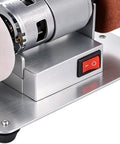 Powerful Mini Bench Grinder With 100W Brushless Motor Delivers Lightning Fast Six Thousand RPM Grinding Action view showing motor and power switch.