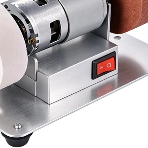 Powerful Mini Bench Grinder With 100W Brushless Motor Delivers Lightning Fast Six Thousand RPM Grinding Action view showing motor and power switch.