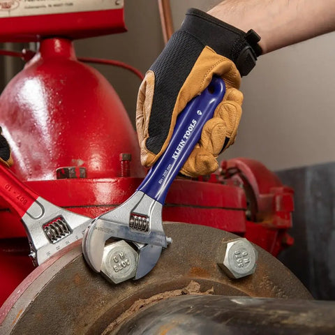 Using the Extra Wide Jaw Adjustable Wrench 8 Inch Forged Drive Tool With High Polish Chrome Finish Built For Tight Spaces One And A Half Inch Jaw Capacity to tighten a bolt.