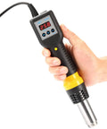 Pro Grade Hot Air Rework Station With Digital Temperature Control And 600W SMD Desoldering Gun held in hand showing LED display