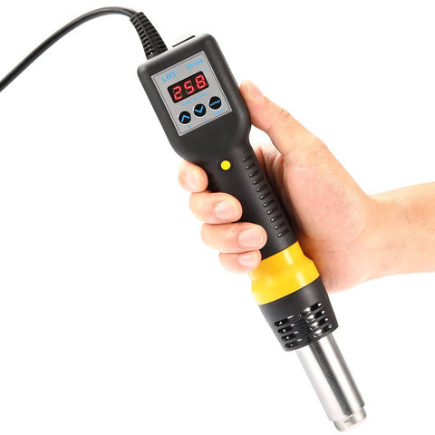 Pro Grade Hot Air Rework Station With Digital Temperature Control And 600W SMD Desoldering Gun held in hand showing LED display