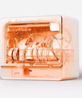 Flat Out Reliable Compact Countertop Dishwasher With Fully Automatic Smart Drying And Triple Wash Filter For Tiny Kitchens Or Rv Campers No Sweat Setup showcasing interior with plates and water spray.
