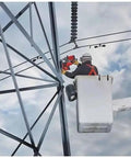 Tough As Nails Lineman Magnetic Drill Kit Featuring Self Powered Magnet Base in use, drilling steel structure at height.