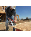All Magnesium Sidewinder Circular Saw With 15 Amp Dual Field Motor And 7-1/4 Inch Blade cutting through wood on a jobsite.