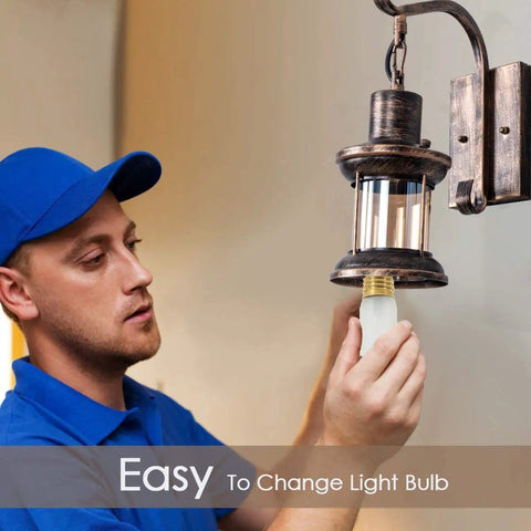 Person changing bulb in 2 In 1 Black Rustic Wall Light With Industrial Glass Shade Lantern Metal Wall Sconce For Home Bedroom Dining Room Cafe Hardwired Or Plug In Vintage Industrial Lighting 2 Pack