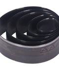 5 Piece Leather Die Cutting Dies Set With Oval Hollow Punches in black steel material, coiled view, for DIY crafts.
