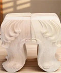 4 Pcs Solid Wood Furniture Legs With Rose Carved Design, heavy duty sofa table feet viewed from front on wooden surface