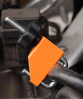 Close-up of the 4 Piece Hose Pinch Off Pliers Set For Fuel Line Coolant Radiator Brake Hoses Automotive Clamp Pliers in use