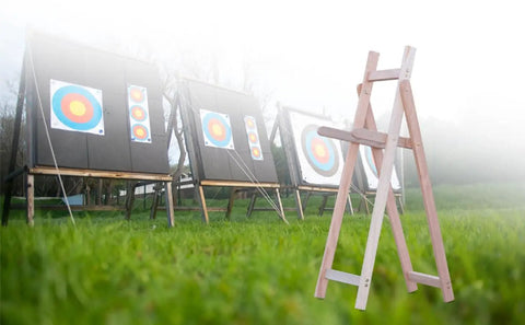 Adjustable Wooden Archery Target Stand for Backyard Practice against outdoor target boards, fits recurve longbow and compound bow