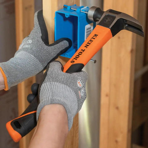 Heavy Hitting 16-Ounce Straight-Claw Hammer With Smooth Head, 13-Inch Length, Fiberglass Shock Absorbing Grip shown in use