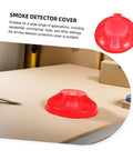 Tough Plastic Smoke Alarm Covers Four Pack Waterproof Dust Protector Shield Keep Kitchen Detectors Spotless Hassle Free Easy Snap On Grease Guard For Busy Kitchens on a table.