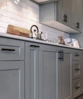 Modern kitchen with cabinets featuring 2 Pack Round Bar Cabinet Pulls Matte Black Finish Euro Style T Bar Handles With 3 Inch Center To Center Mounting And 5 Inch Overall Length Stainless Steel Construction Durable And Sleek Cabinet Hardware For Kitchen And Furniture.