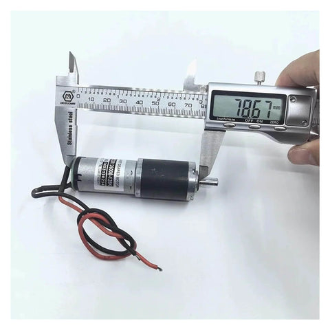 Dope 25mm Planetary Gearbox for DC Motors being measured, showing electronic starter, high torque gear reducer for DIY robotics