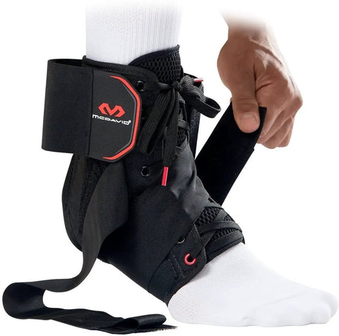 Ultralight Ankle Brace for Sprains With Figure 8 Support Lace Up Ankle Brace That Fits Over Socks shown being worn