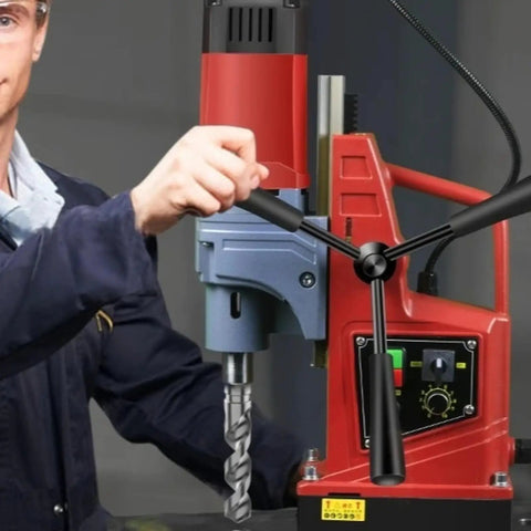Kickass Portable Magnetic Drill Press Tough As Nails Industrial Grade Workhorse For Heavy Duty Steel And Metal Fabrication With Ac Power Smooth Vertical Action On Job Sites, close-up of operator using drill.