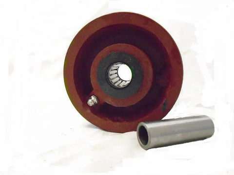 Tough As Nails Heavy Duty Rigid Casters Set Of Four With 4 Inch Ductile Steel V Groove Wheels Smooth Roller Bearings And Deep Burgundy Finish For Shop Cart Applications; close-up of a single caster wheel with ball bearings and ductile steel.