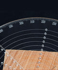8-inch round center finder compass for woodworking; front view, black protractor with white degree marks.