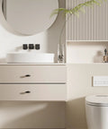 Bathroom setup with 1 Pack 2 Inch Cabinet Knob and Drawer Pull, Dope Black Zinc Alloy Cabinet Handle on beige drawers.