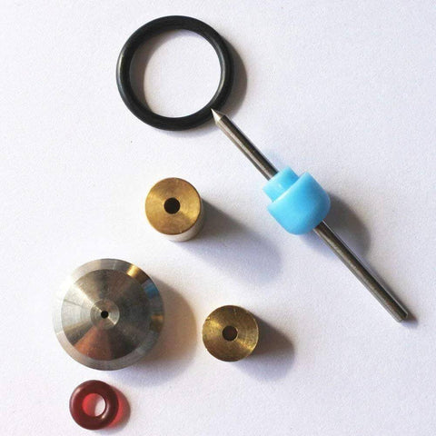 Top-down view of waterjet on/off valve repair kit; 7-piece set with metal shaft, blue spacer, brass discs, red and black O-rings.