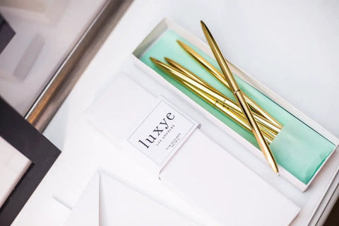 Premium Ballpoint Pen Set Of 6 In Glossy White Gift Box With Gold Pens Displayed Open On Table