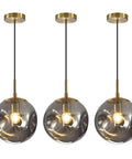 Modern Smoke Gray Glass Globe Pendant Light 3 Pack, 7.87" Hardwired Brass Pendant with Adjustable 59" Cord, stylish light fixture.