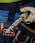 Gloved hand holding Do-It-All 9-In-1 Pass-Through Nut Driver With Cushioned Grip, SAE Hex Sizes From 3/16 To 3/4 Inch in workshop.