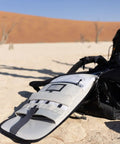 80L Adventure Camera Backpack For DSLR And Cinematography Gear With Cine Master ICU and Gatekeepers in desert setting, Anthracite color.