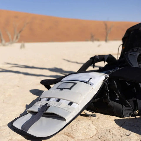 80L Adventure Camera Backpack For DSLR And Cinematography Gear With Cine Master ICU and Gatekeepers in desert setting, Anthracite color.