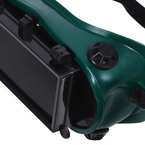 Close-up of Heavy Duty Double Flip Welding Goggles With Impact Resistant Lenses showing flip mechanism and adjuster.
