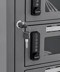 Close-up of Secure 24 Door Clear View Cell Phone Charging Locker With USB C Micro Lightning Ports, grey keypad and key.