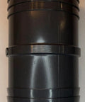 Four Pack 2 1/2 Inch Black Plastic Insert Coupling Built Damn Tough Hose Fitting Connector showing barbed connect design.