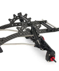 Close-up of Beefy Carbon Fiber LCG Chassis Kit with 3mm rails, 8mm Delrin skid plate, CMS servo panhard mount for RC crawlers.