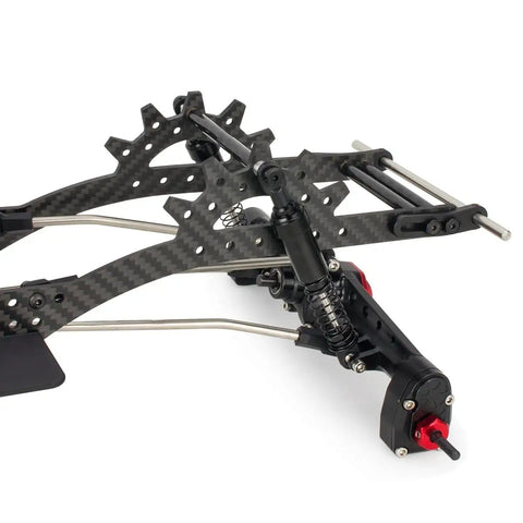 Close-up of Beefy Carbon Fiber LCG Chassis Kit with 3mm rails, 8mm Delrin skid plate, CMS servo panhard mount for RC crawlers.