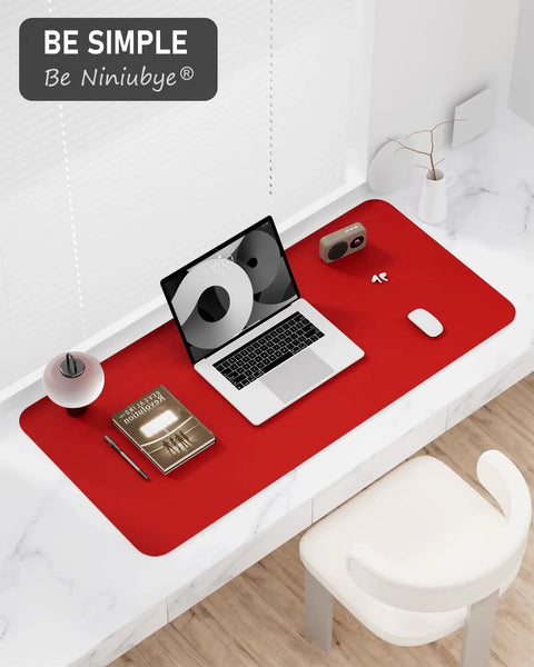 Bright Red Desk Pad 23.6 By 13.8 Inch PU Leather Non Slip Desk Mat For Laptop Mouse Keyboard Writing And Gaming Waterproof Office And Home Use Everyday Dope on desk with laptop and books.