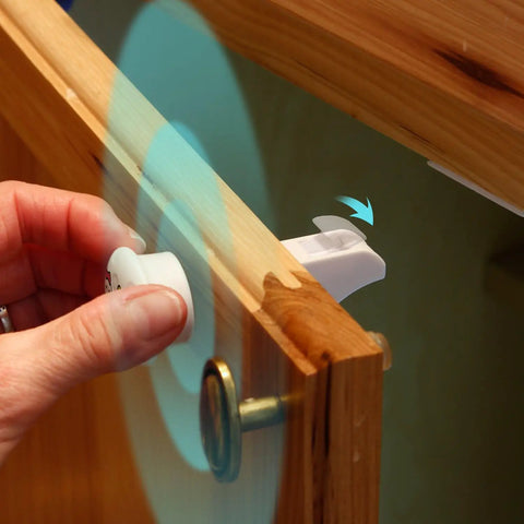Childproof Cabinet Locks Kit With 12 Locks And 2 Keys Adhesive Mount demonstration on wooden cabinet door
