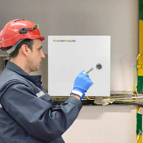 Worker installing Rugged Outdoor Electrical Box With Lock And Mounting Plate Heavy Duty Steel Junction Enclosure 12 By 10 By 6 Inches NEMA 4X IP66 Waterproof Dustproof Weatherproof Project Box Built To Last For Tough Outdoor Installations on wall.