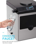 Top Shelf Electric Ice Cube Maker Machine With Integrated Water Dispenser pouring water into a glass from concealed faucet.